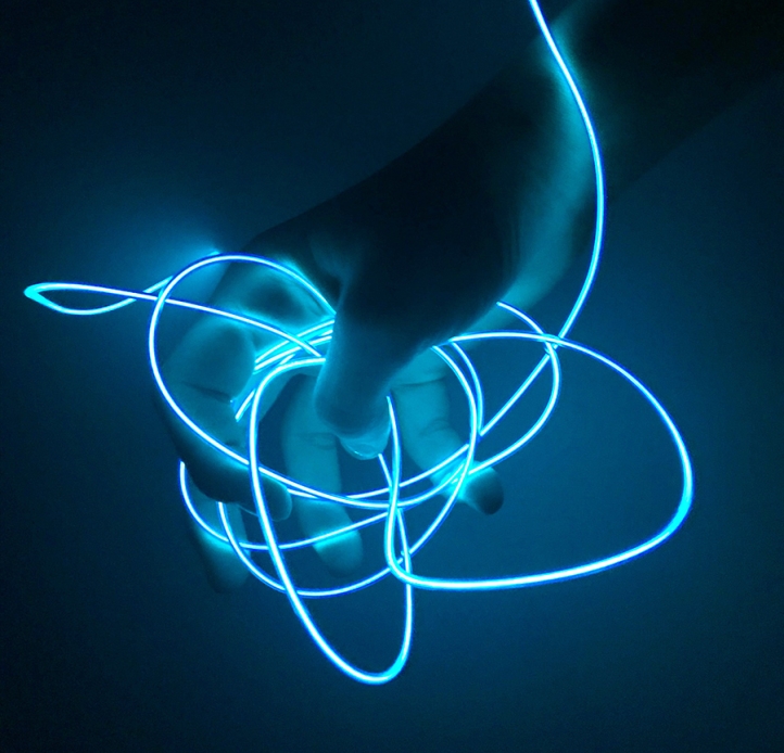Hand holding string lighting